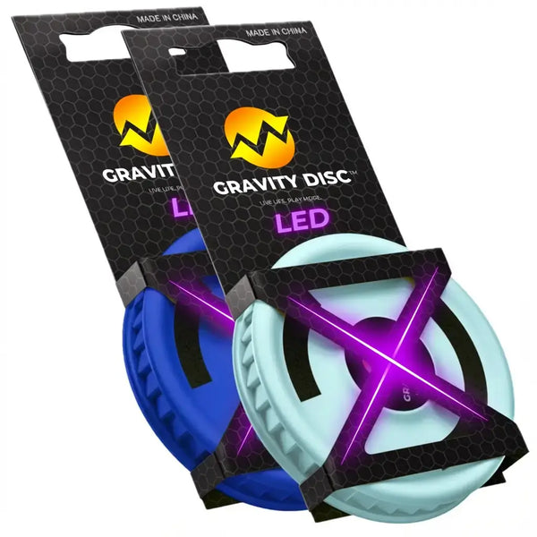 Two Gravity Disc LED toys in packaging with visible branding.